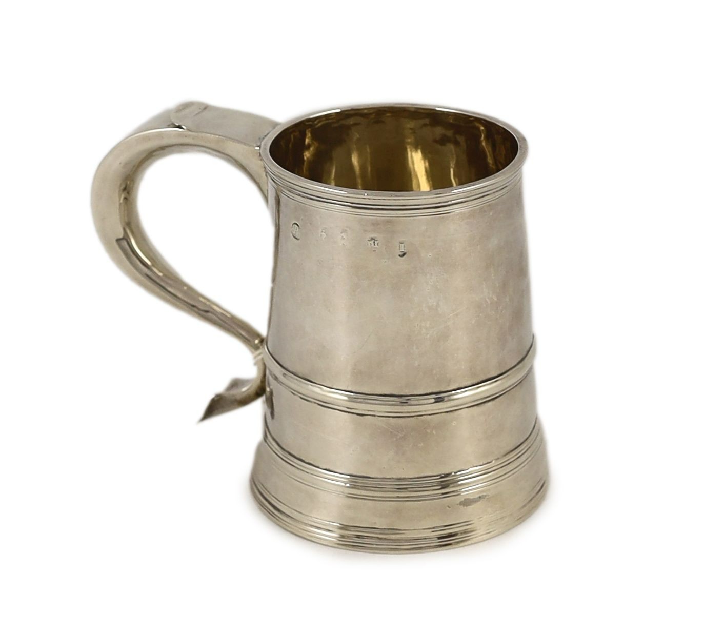 A Queen Anne Britannia standard provincial silver mug, by Edmond Richards